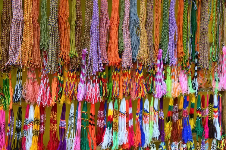 A display of colourful bracelets