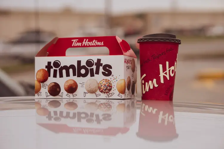 Timbits, slang for doughnut holes, and a coffee from the Canadian coffee shop, Tim Hortons