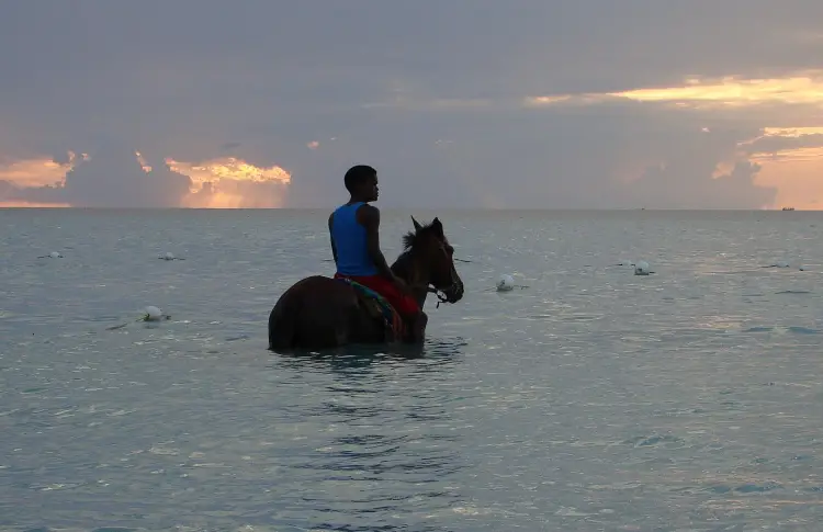 Beach horseback riding, which is one of the most popular things to do Ocho Rios