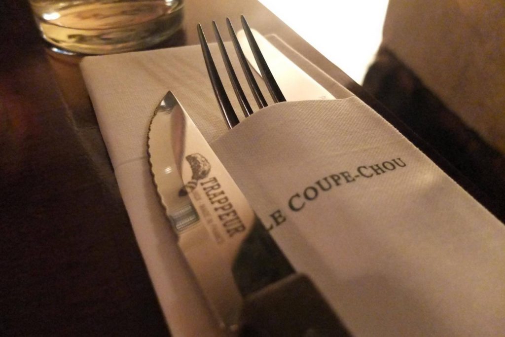 Place setting at Le Coupe-Chou, one of the best places to eat escargot in Paris